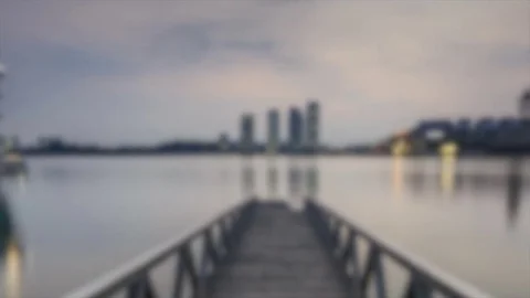 Blurred Time lapse scenery of sun rising at Pullman, Putrajaya. Zooming Out Stock Footage 83015863