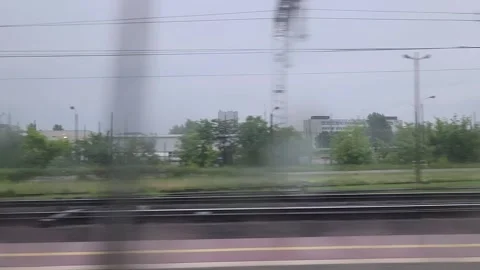 Blurred train window view with railway tracks 스톡 동영상 336741789