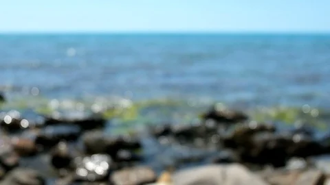 Blurred unfocused background of the sea or ocean. Bokeh effect. Shore of sea or Stock Footage 114893827