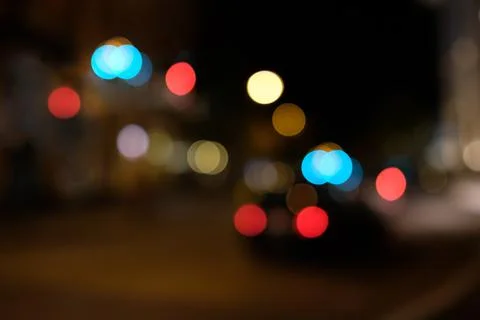 Blurred unsharp bokeh with red blue and yellow lights Stock Photos