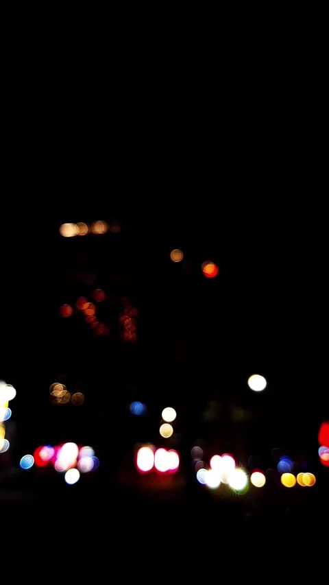 Blurred Urban Background. Bokeh Lights Traffic. Abstract Urban Lights Stock Footage 321788023