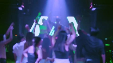 Blurred version of footage. Group of people happy dancing come celebrate concert Video stock 136471788
