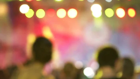 Blurred version. Group of cheerful active excited people dancing at musical Stock Footage 78699756