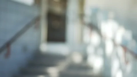 Blurred video background plate of front steps to urban building entrance Stock Footage 96271378