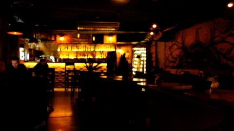 Blurred video of the interior of a large beautiful restaurant in low lighting Stock Footage 121414907