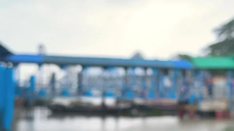 Blurred view of a blue industrial structure with a hazy sky in the backgrou.. Stock-Footage 340052557