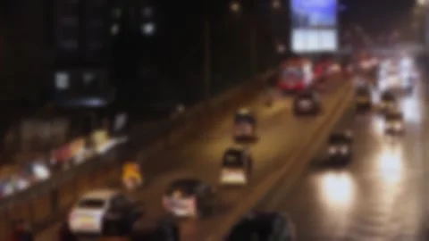 Blurred view of the busy road traffic late in the evening Stock Footage 300242029