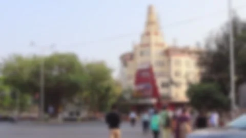 Blurred view of a busy road traffic in front of the Eros Cinema in Mumbai. Stock Footage 301633679