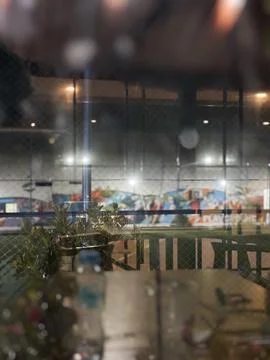 Blurred view captured through a mesh fence or slightly reflective glass Stock Photos