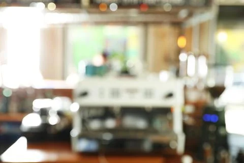 Blurred view of coffee machine on bar counter in cafe Stock Photos