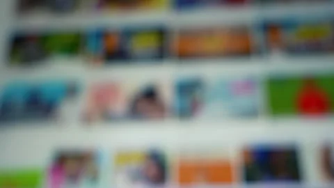 Blurred view of a computer display screen scrolling background Vídeos de archivo 337899170