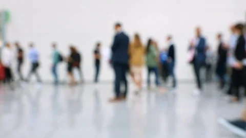 Blurred view of crowd of people with man waiting Stock Footage 116026409