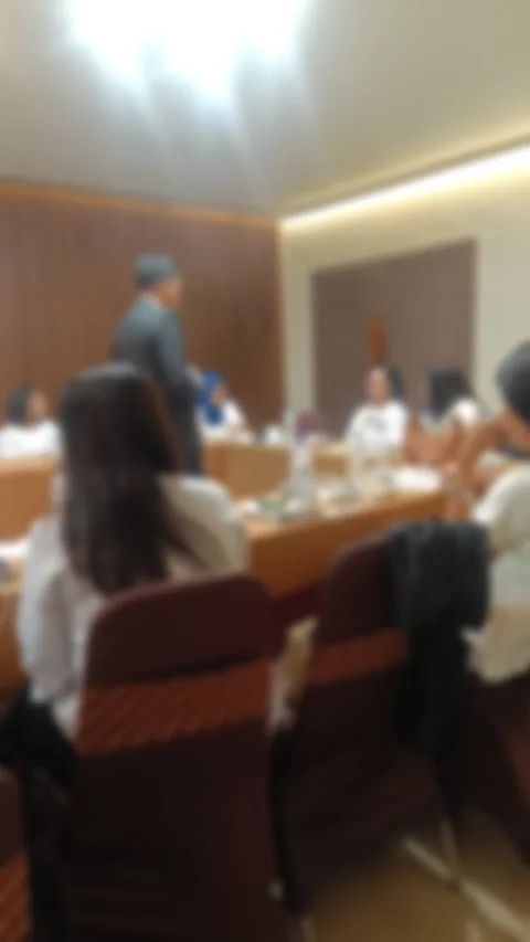 A blurred view of A diverse group professionals gathered in a modern conference Stock Footage 340533829