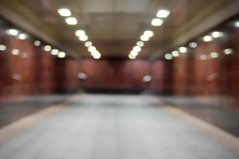 Blurred view of an empty underground pedestrian crossing with no people Stock-Fotos