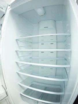 Blurred view of an empty white refrigerator Stock Photos