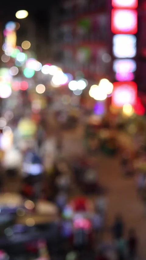 Blurred view of the Main Bazar road with evening traffic in New Delhi, India Stock Footage 322258591