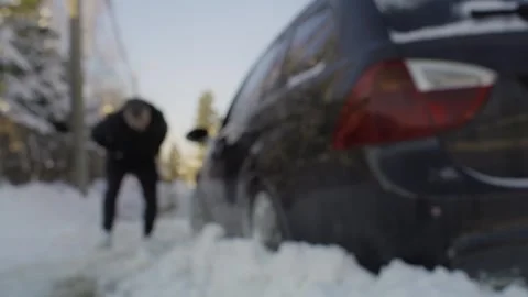 Blurred view of man having problem with his car in the winter Stock Footage 258435262