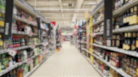 Blurred View Moving Through a Supermarket Liquor Aisle in France Vídeo Stock 334652914
