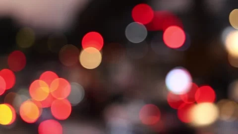 Blurred view of night traffic car lights on a busy street Stock Footage 310781259