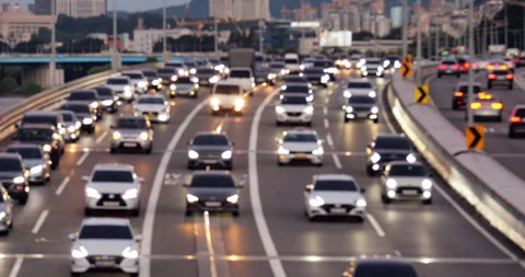 Blurred view of Olympic-daero traffic in twilight, one line almost static Stock Footage 295061820