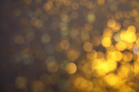 Blurred view of shiny lights on grey background. Bokeh effect Foto stock