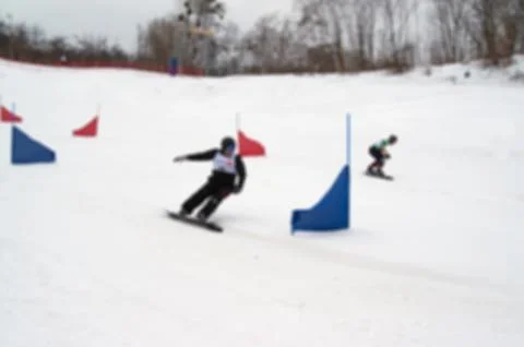 Blurred view of snowboarding giant parallel slalom competitions Stockfoto's