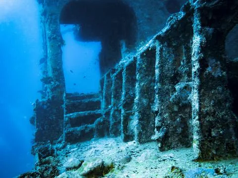 A blurred view of the steps and iron structures of the sunken ship Stock Photos