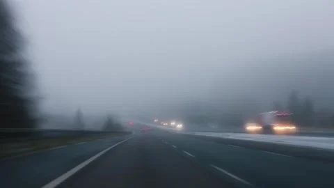 Blurred View Through The Car Windshield While Driving On The Highway At Dusk Stock Footage 283919333