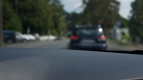 Blurred view through the front window of the car. The car goes on a country road Stock Footage 101783612