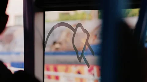 Blurred view through a train window with city reflections and graffiti Stock Footage 320438438