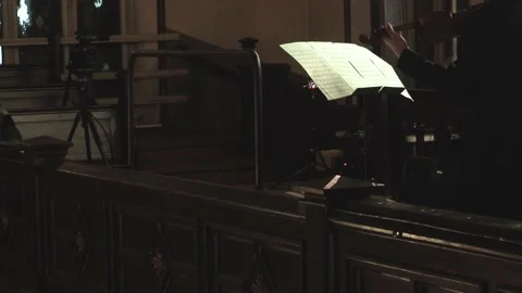 Blurred violinist performs playing with notes Stock Footage 146391727