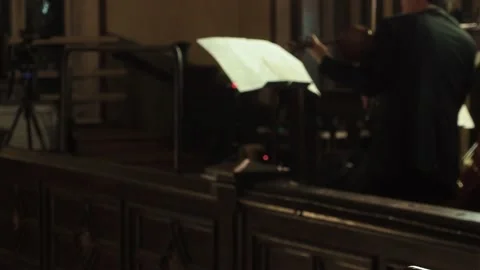 Blurred violinist performs playing with notes Stock Footage 146391834