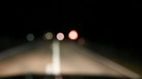 The blurred vision of a drunk driver in dangerous driving. Dangerous Stock Footage 305512234