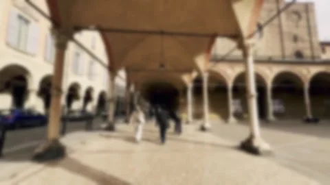 Blurred vision gradually focusing on a historic italian city square Stock Footage 343548929