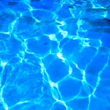 Blurred water surface Stock Photos