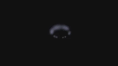 Blurred white light streaks against a solid black background environment Video stock 335117345