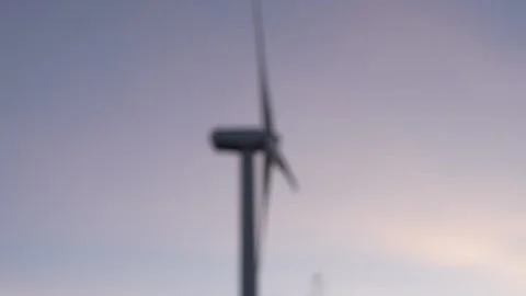 Blurred Wind Turbine Generating Electricity in Motion Stock Footage 295880720