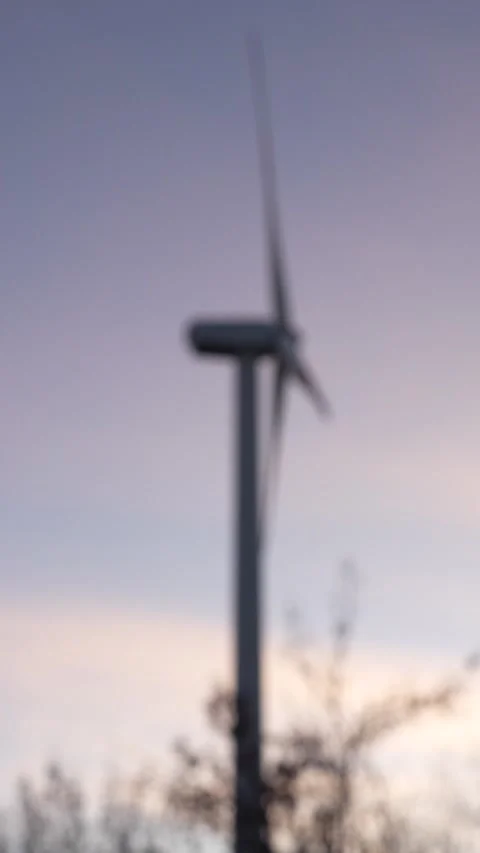 Blurred Wind Turbine Generating Electricity in Motion Stock Footage 295880723