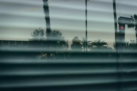 Blurred window Blinders with Abstract Reflections of promenade Stock Photos