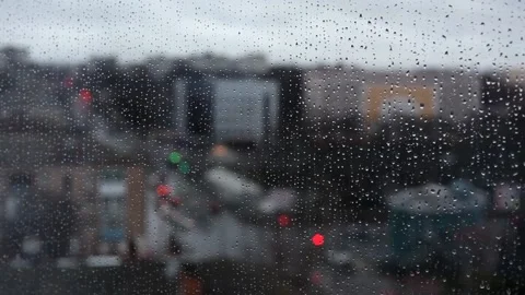 Blurred window view of the city on a rainy day. Stock Footage 167679515