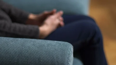 Blurred woman's hands during session by the psychotherapist: anxiety, stress  Stock Footage 85831027