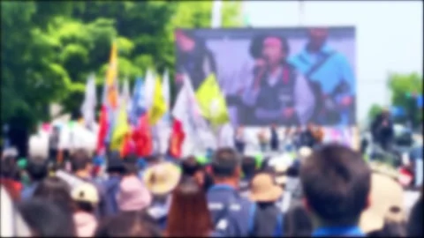 Blurred, Workers' Day, workers protesting for workers' rights and interests Video stock 274401883