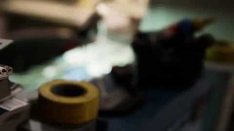 Blurred Workshop Desk With Electronic Components and Tools Stock Footage 348395838