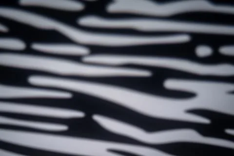 Blurred zebra light gobo pattern background Stock Photos