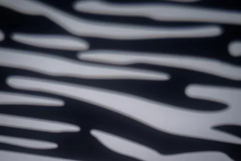 Blurred zebra light gobo pattern background Stock Photos
