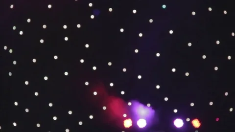 Blurried spots of light in a stage coming into focus Stock Footage 79537976