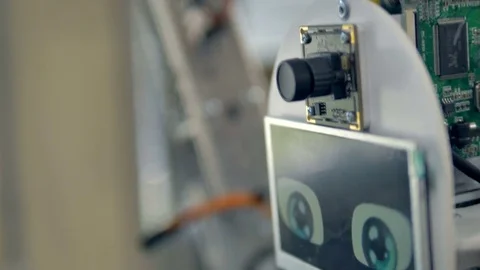 Blurring and focusing shot on robots head and arm. Stock Footage