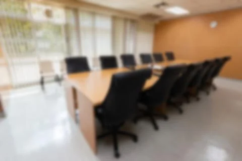 Blurry abstract background of empty modern boardroom, meeting office room Stock Photos