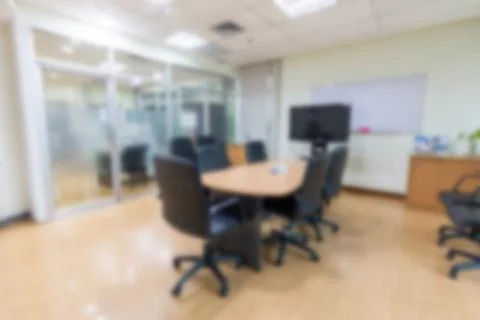 Blurry abstract background of empty modern boardroom, meeting office room Stock Photos
