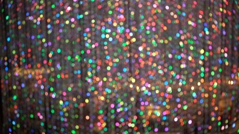 Blurry abstract colorful background. Colored garland. Bokeh and defocusing Stock Footage 107021089